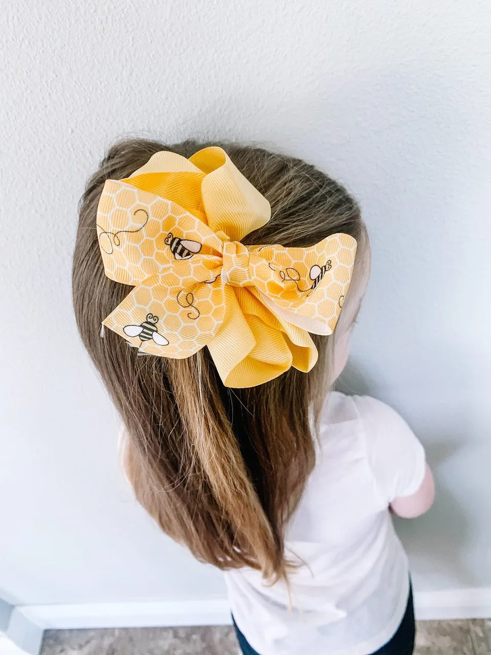 Buzzing Bees Ribbon with a yellow comb background on 7/8" " white grosgrain